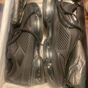 Prada Men's Sleek Black Sneakers - Cloudburst Air